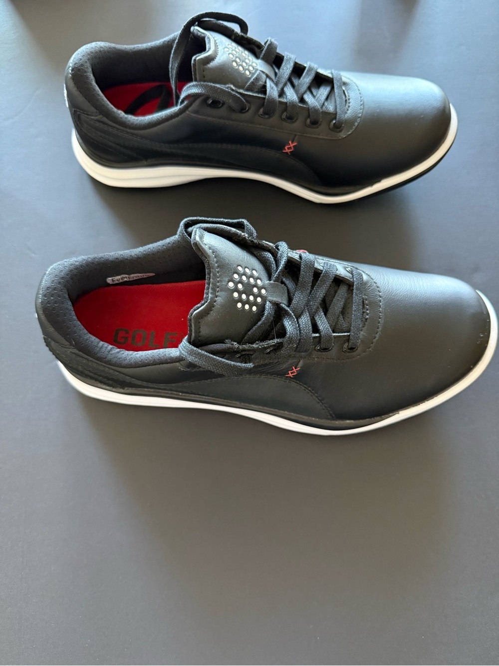 Puma Men’s Golf Shoes Black/Red Leather Look
Spiked Cleats US 7.5 EUC